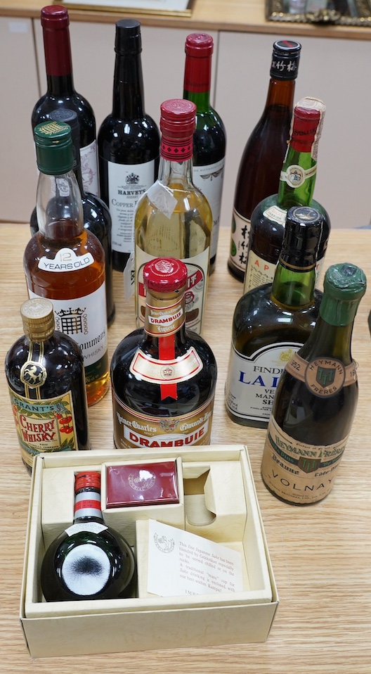 Twelve various bottles of wine, sherry and spirits and a miniature, including Drambuie, House of Commons scotch whiskey, Harveys Copper Beech Sherry, apricot brandy, etc. Condition - good